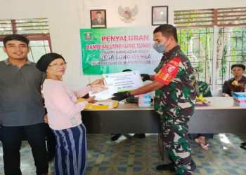 Babinsa Koramil 0909-03/Muara Wahau Terus Bergerak Kawal Penyaluran BLT-DD