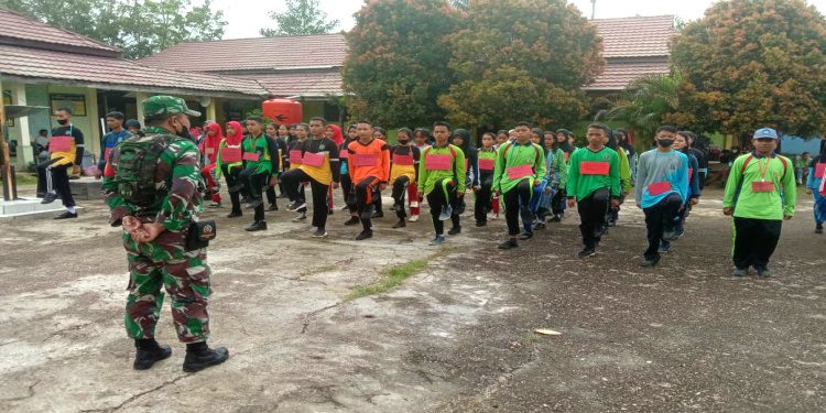 Tumbuhkan Jiwa Patriotisme dan Kemandirian, Koramil 0909-03/Muara Wahau Bekali Pelajar Dengan Wawasan Bela Negara