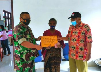 Babinsa Koramil 0909-03/Muara Wahau Laksanakan Pendampingan Penyaluran BLT-DD