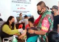Babinsa Koramil 0909-03/Muara Wahau Dampingi Pelaksanaan Vaksinasi Masyarakat, Ini Tujuannya