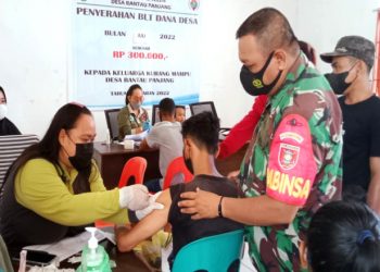 Babinsa Koramil 0909-03/Muara Wahau Dampingi Pelaksanaan Vaksinasi Masyarakat, Ini Tujuannya