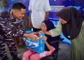 Peduli Pesisir, Lanal Sangatta Bawa Sembako, Layanan Medis, dan Fasilitas Pendidikan ke Desa Pulau Miang