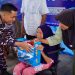 Peduli Pesisir, Lanal Sangatta Bawa Sembako, Layanan Medis, dan Fasilitas Pendidikan ke Desa Pulau Miang